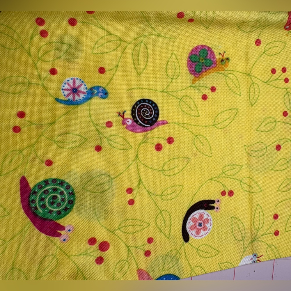 Snail Trails colorful print on yellow background. 1/2 yard cut cotton.